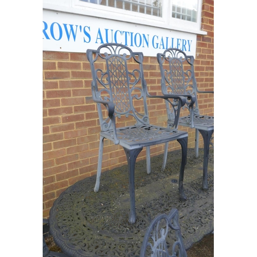 1120 - A painted metal garden table and six chairs ensuite, 187 x 95cm