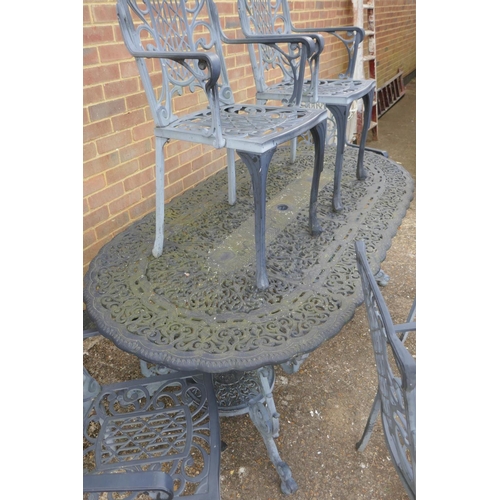 1120 - A painted metal garden table and six chairs ensuite, 187 x 95cm