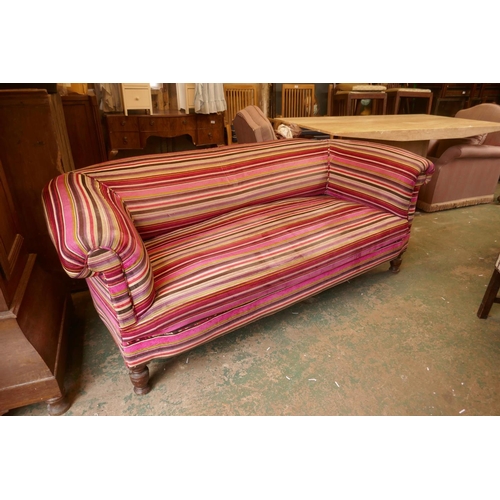 1122 - A Victorian Chesterfield settee upholstered in contemporary fabric, 200cm wide