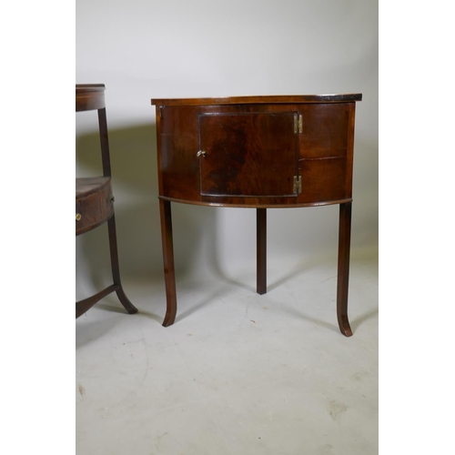 1148 - A Victorian mahogany bow front corner washstand with single cupboard door, raised on sabre supports,... 