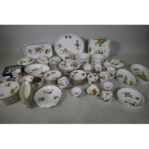 116 - A Royal Worcester Evesham pattern part dinner/tea service and twelve associated Royal Tudor ware pla... 