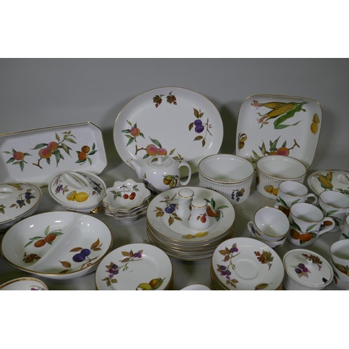 116 - A Royal Worcester Evesham pattern part dinner/tea service and twelve associated Royal Tudor ware pla... 