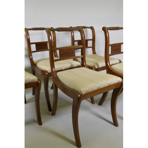 1174 - A set of six Regency style mahogany dining chairs with rope twist backs