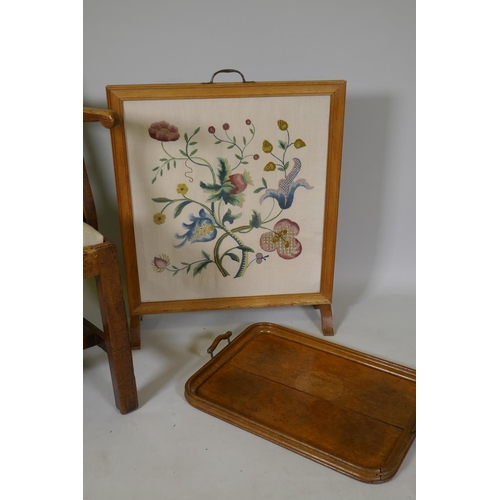 1203 - An Arts & Crafts oak fire screen with embroidered panel, 57 x 74cm, an oak gallery tray and an e... 