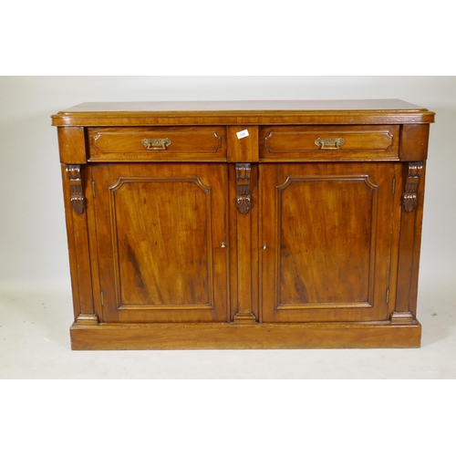 1206 - A Victorian mahogany buffet/sideboard, with two drawers over two cupboards and corbel decoration, ra... 