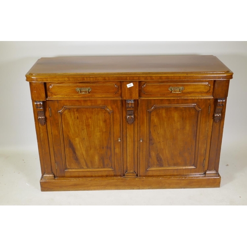 1206 - A Victorian mahogany buffet/sideboard, with two drawers over two cupboards and corbel decoration, ra... 