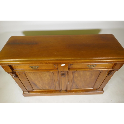 1206 - A Victorian mahogany buffet/sideboard, with two drawers over two cupboards and corbel decoration, ra... 