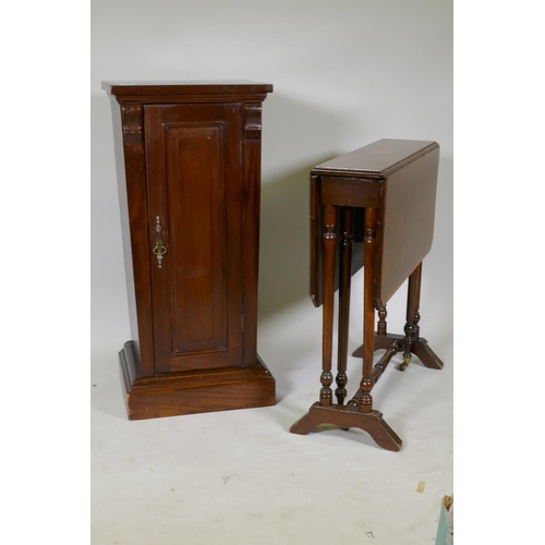 1208 - A Victorian mahogany pedestal cupboard of tapering form, raised on a plinth base, 41 x 33 x 88cm and... 