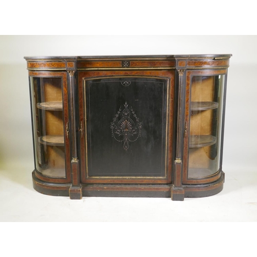 1234 - A Victorian Aesthetic ebony and amboyna inlaid credenza with brass mounts, the inverted breakfront t... 