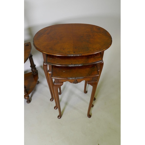 1239 - A Victorian inlaid walnut whatnot of three tiers united by twisted supports, 83cm high, a nest of th... 