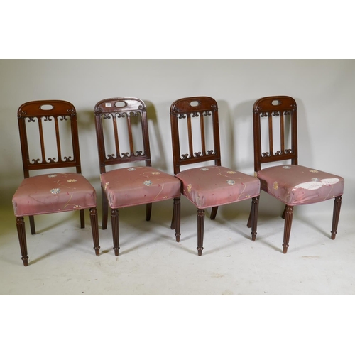 1247 - A set of four early C20th Continental mahogany dining chairs with carved slat backs