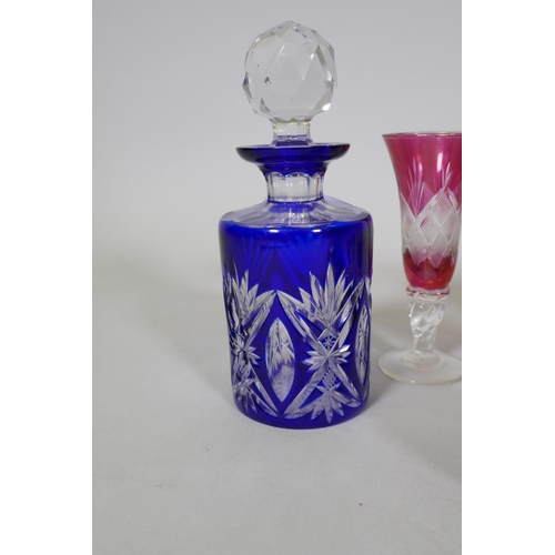 14 - A Bohemian overlaid blue glass decanter/scent bottle, 16cm high, an Isle of Wight Glass scent bottle... 