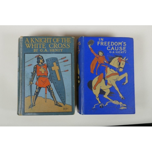 142 - G.A. Henty, eight vintage novels including A Knight of the White Cross, In Freedom's Cause, Wulf the... 