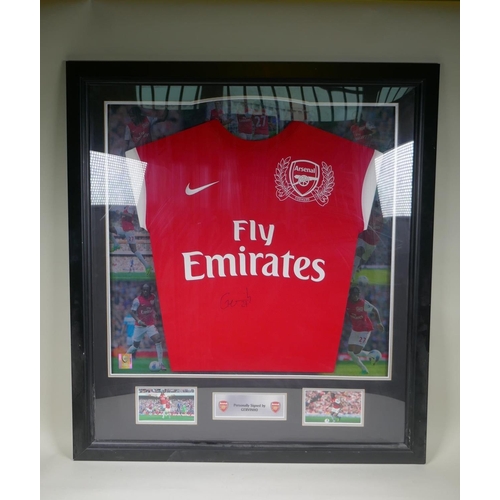 144 - An Arsenal 2011-12 Home Kit celebrating the club's 125th anniversary, signed by Gervinho, framed wit... 