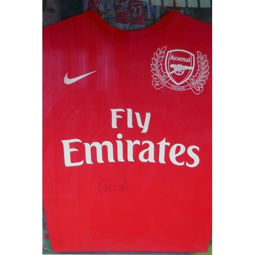 144 - An Arsenal 2011-12 Home Kit celebrating the club's 125th anniversary, signed by Gervinho, framed wit... 