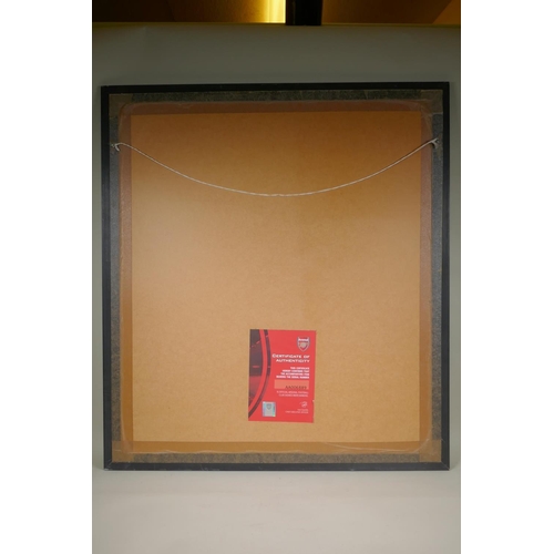 144 - An Arsenal 2011-12 Home Kit celebrating the club's 125th anniversary, signed by Gervinho, framed wit... 