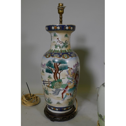 153 - A Chinese ceramic table lamp with blue and white decoration and wood base, 58cm high, and two others