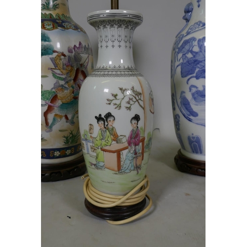 153 - A Chinese ceramic table lamp with blue and white decoration and wood base, 58cm high, and two others