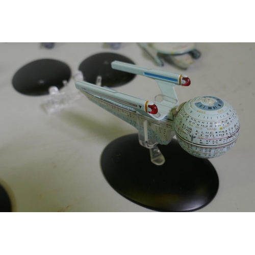 154 - A large collection of CBS studios Star Trek models, the majority with correct stands