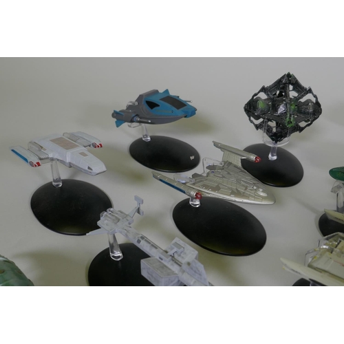 154 - A large collection of CBS studios Star Trek models, the majority with correct stands