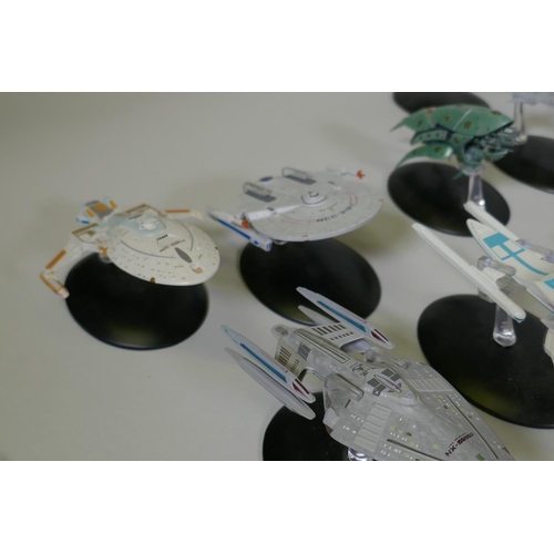 154 - A large collection of CBS studios Star Trek models, the majority with correct stands