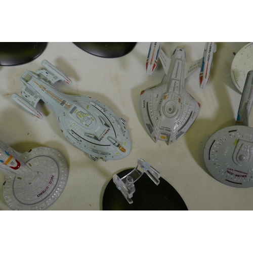 154 - A large collection of CBS studios Star Trek models, the majority with correct stands