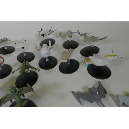 154 - A large collection of CBS studios Star Trek models, the majority with correct stands