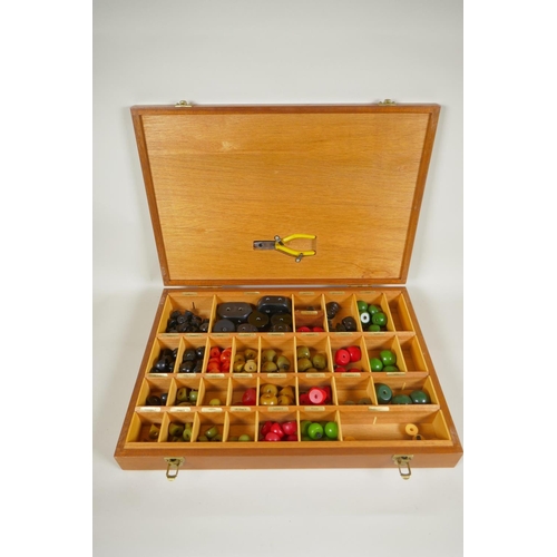 16 - A vintage bakelite molecular modelling kit in a fitted box, 50 x 35cm