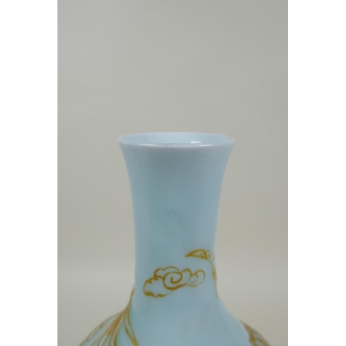 168 - A Chinese celadon ground porcelain vase with raised and gilt dragon decoration, Qianlong seal mark t... 