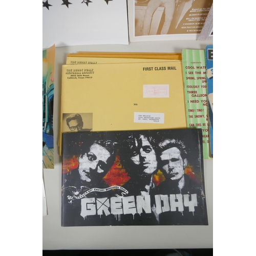 173 - A quantity of rock and pop memorabilia including Green Day, Buddy Holly, Oasis, Bruce Springsteen, e... 