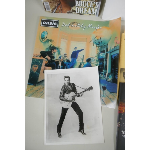 173 - A quantity of rock and pop memorabilia including Green Day, Buddy Holly, Oasis, Bruce Springsteen, e... 