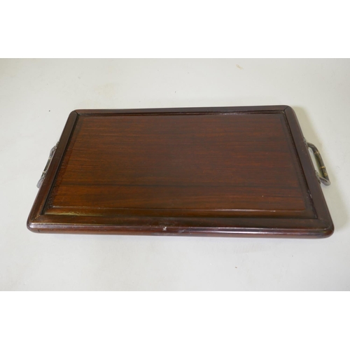 177 - A Chinese rosewood tray inlaid with silver decoration of prunus blossom, 48 x 25cm