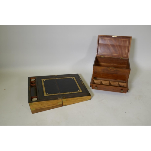 180 - A C19th walnut and brass bound campaign style writing slope with fitted interior, two glass inkwells... 