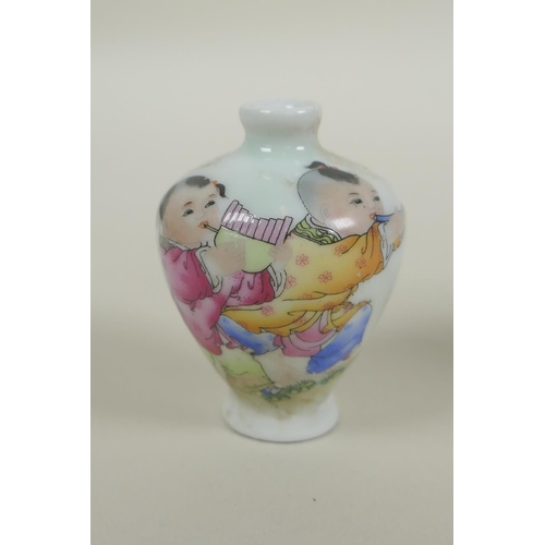 194 - Three Chinese miniature polychrome porcelain vases decorated with carp, children playing, birds, but... 