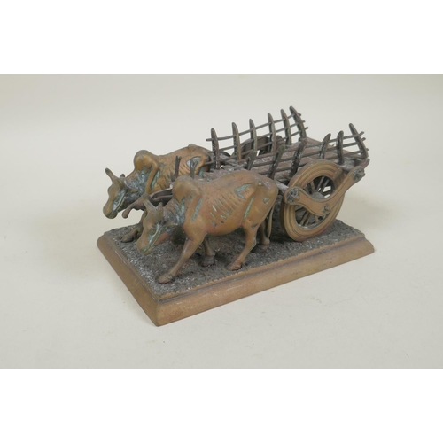 196 - A vintage Indian bronze figure of an ox cart, 17cm long