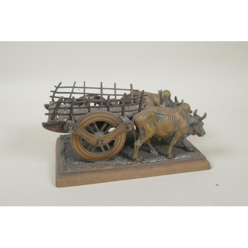 196 - A vintage Indian bronze figure of an ox cart, 17cm long