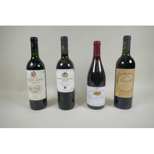 20 - Four bottles of red wine to include a bottle of Navarro Lopez Gran Reserva 1996, a bottle of Baron d... 