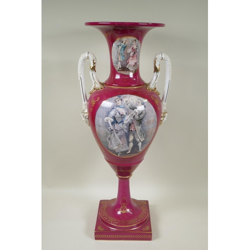 200 - A Sevres style pink ground porcelain two handled urn with decorative panels depicting courting coupl... 