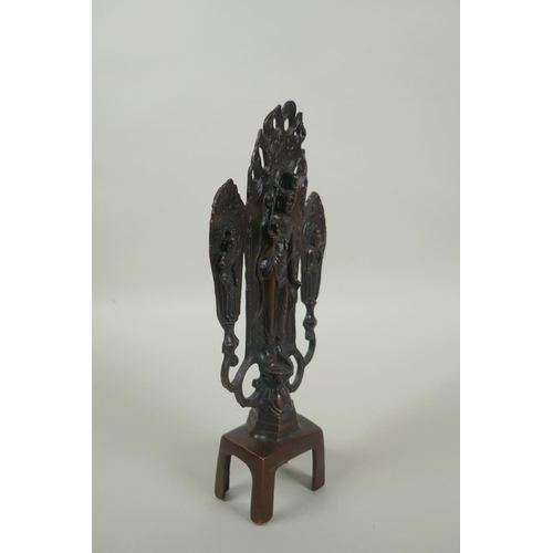 201 - An oriental bronze figure of Buddha, 23cm high