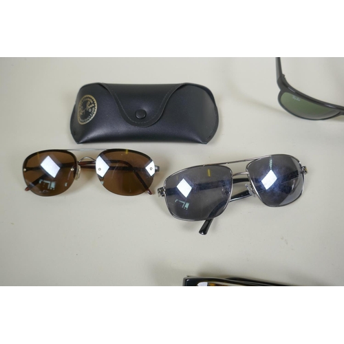 203 - A pair of Ray Ban Bausch & Lomb PS2 sunglasses, a pair of Calvin Klein CK845 067 glasses, and th... 