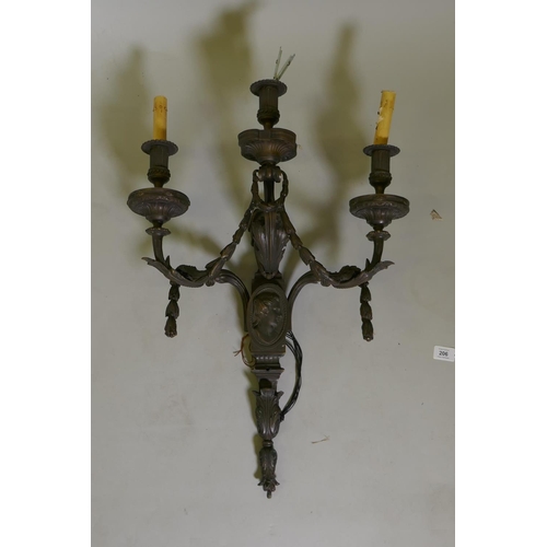 206 - A bronze three branch wall sconce, 50 x 70cm