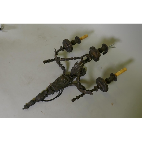 206 - A bronze three branch wall sconce, 50 x 70cm