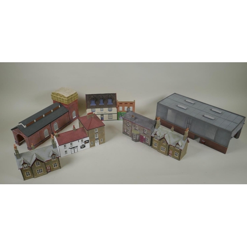 211 - A collection of Bachmann scenecraft 00 gauge model railway buildings to include the Traction Serving... 