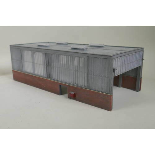 211 - A collection of Bachmann scenecraft 00 gauge model railway buildings to include the Traction Serving... 