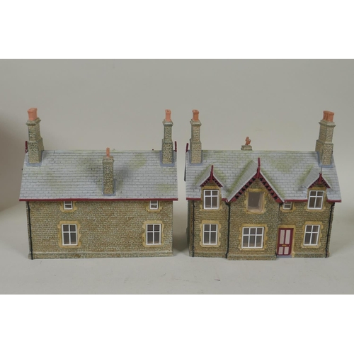 211 - A collection of Bachmann scenecraft 00 gauge model railway buildings to include the Traction Serving... 