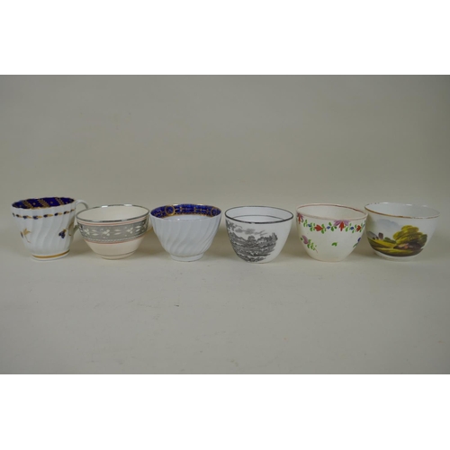 213 - A collection of English C18th and C19th porcelain tea cups and coffee cans, many with hand painted d... 