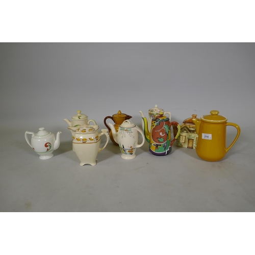 214 - A collection of vintage pottery coffee pots, Doulton, Watcomb, Burleigh etc