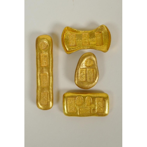 218 - Four Chinese gilt metal ingot/trade tokens, with impressed character stamps, longest 9cm