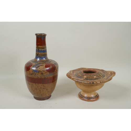 224 - A South American hand painted pottery censer, together with a similar South American pottery bottle,... 