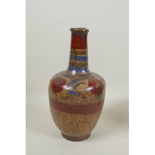 224 - A South American hand painted pottery censer, together with a similar South American pottery bottle,... 